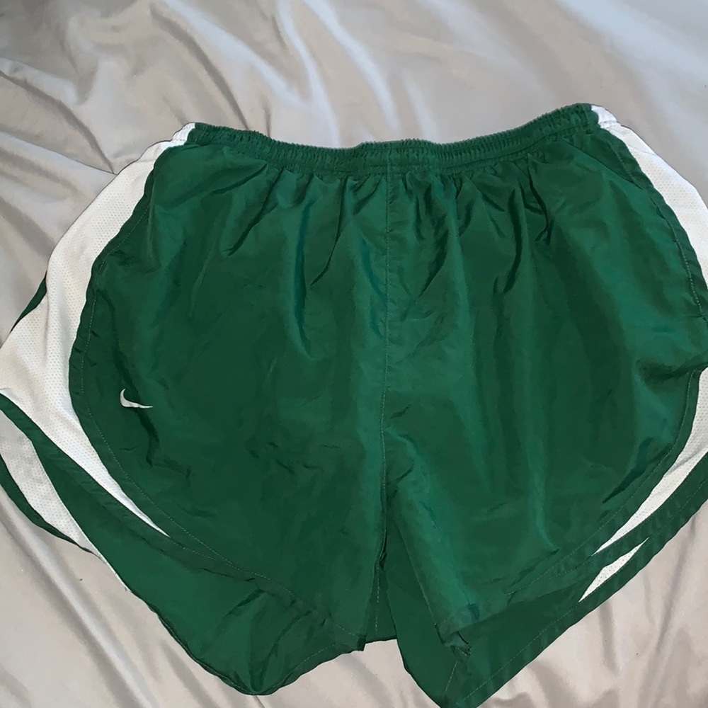 green nike shorts
